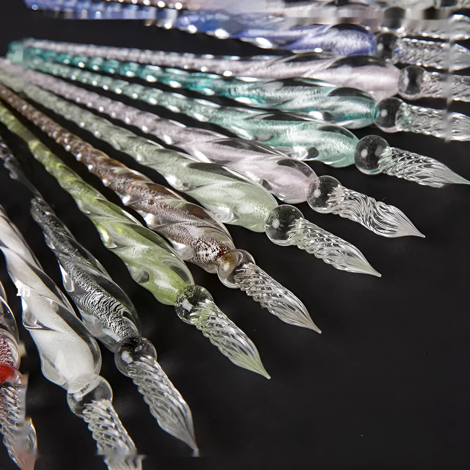 Transparent coloured glass crystal pen with water art ink in gift box, shown in multiple colour options.