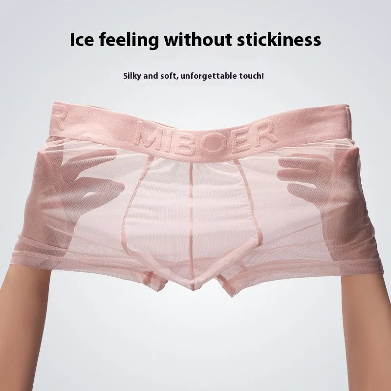 Men's thin solid-colour boxer shorts in black, white, blue, green, pink, and skin colour.