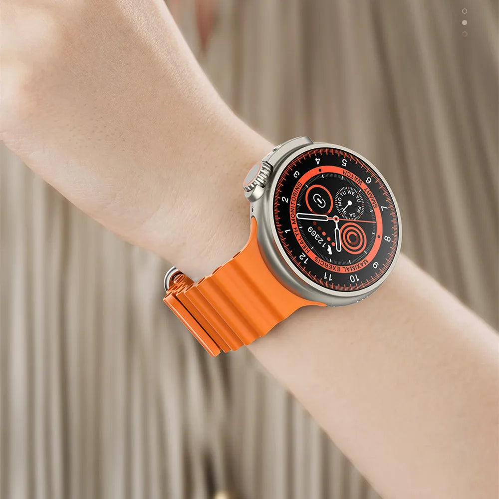 Black K9 smart watch with round screen on a silicone strap, showing a fitness stats dial.