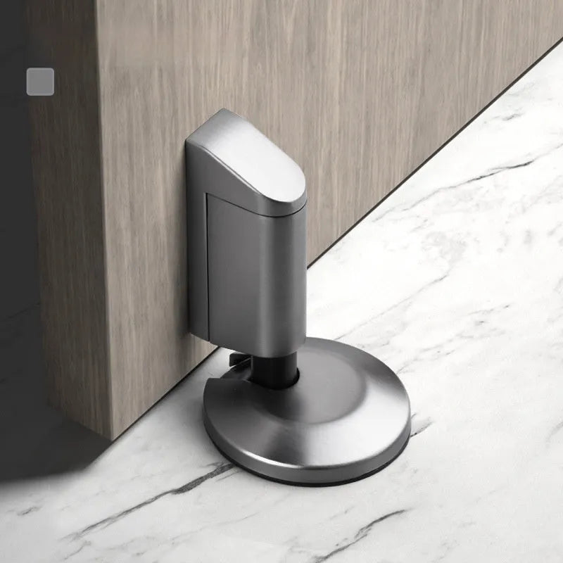 Zinc alloy invisible door stopper in modern design on a bedroom floor
