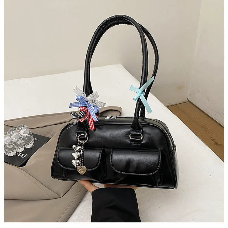 Retro pillow-shaped women's handbag in PU leather with double shoulder strap