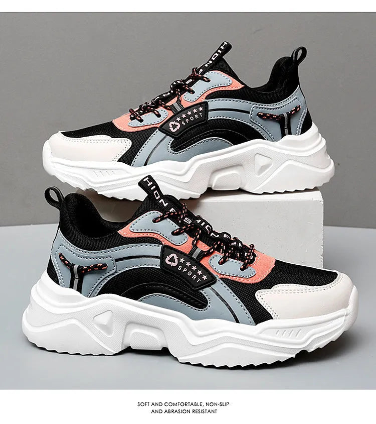 Women's white chunky casual sports shoes with mesh upper and thick mid-heel sole.