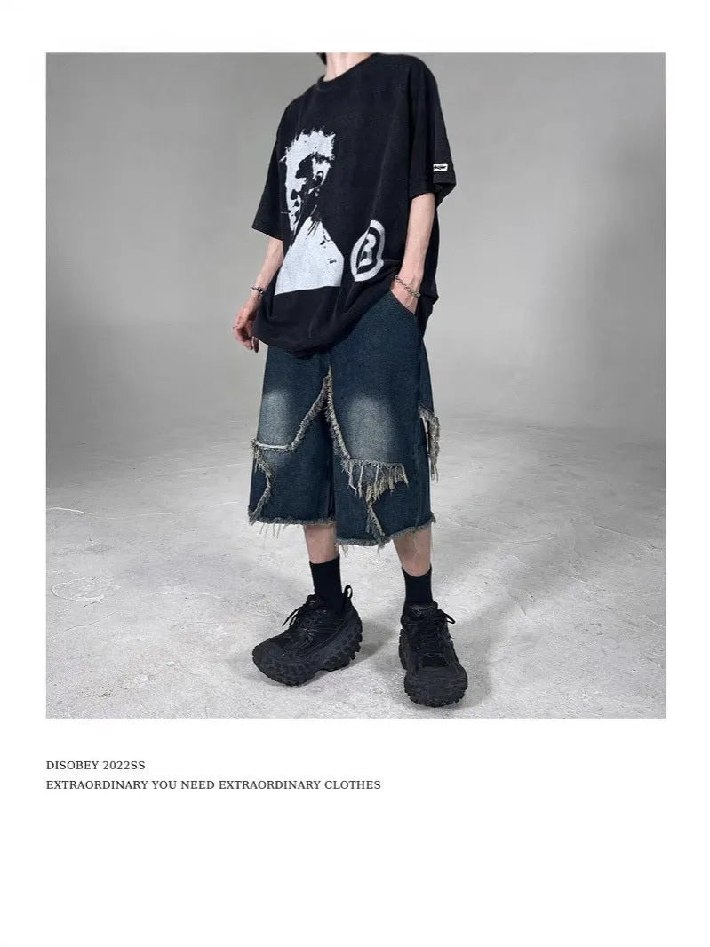 Blue denim shorts with American retro style, frayed detailing, and five-pointed star patches