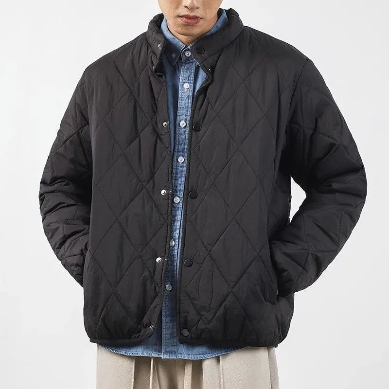 Men's black diamond lattice patterned cotton-padded jacket with a lengthened loose fit.