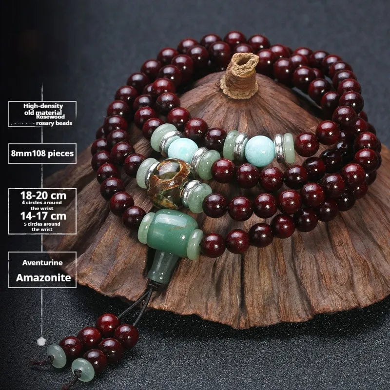 Men's rosewood 108 bead mala bracelet with a turquoise gemstone decorative centrepiece.