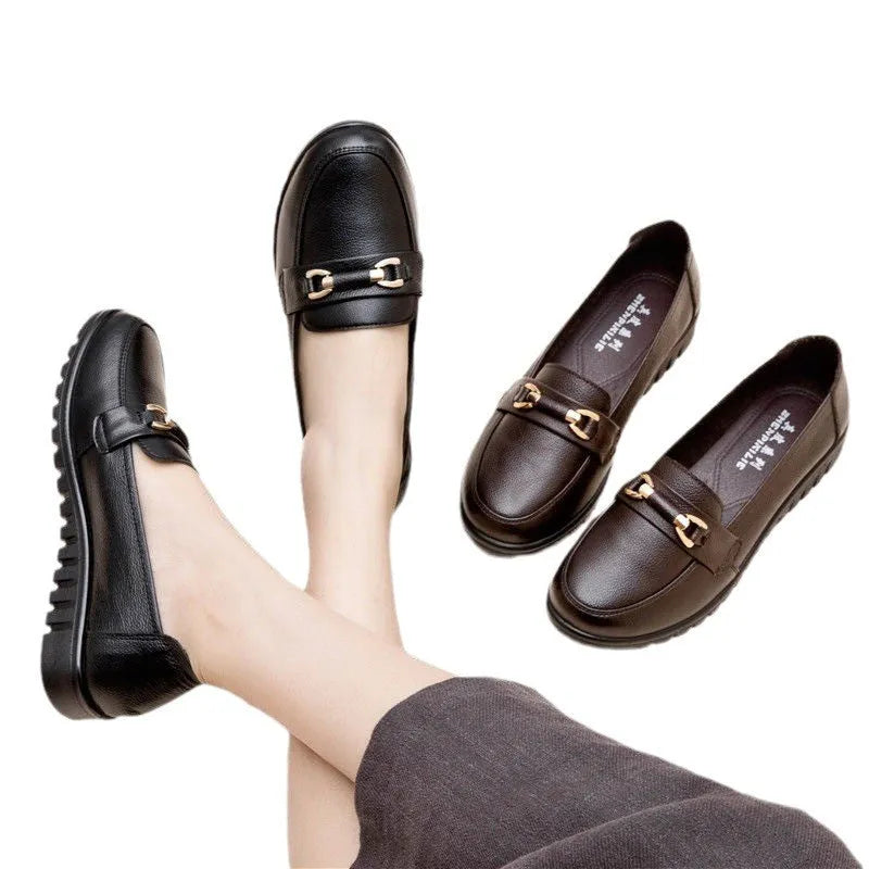 Black women's microfiber slip-on pumps with round toes and low flat heels on rubber soles
