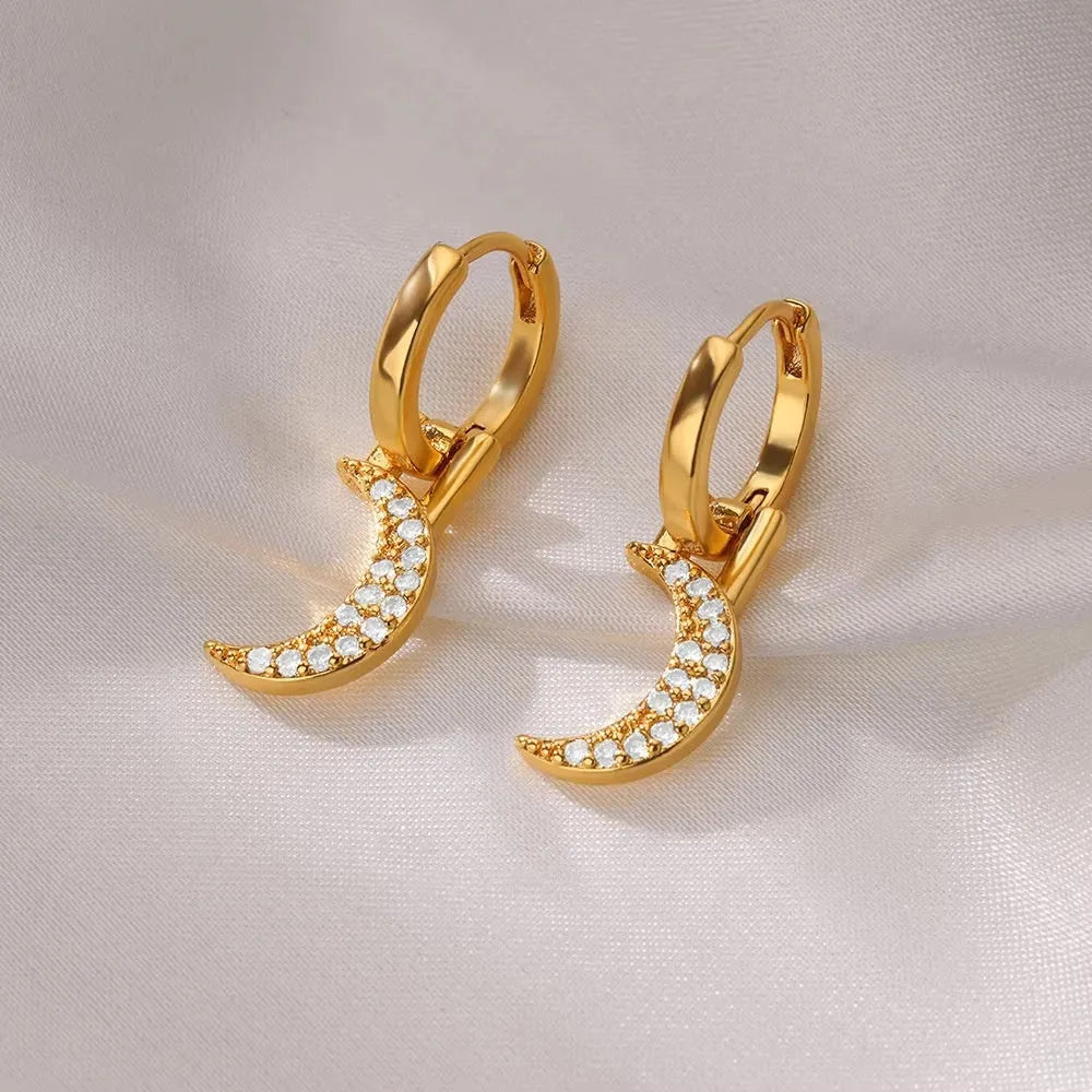 Geometric butterfly earrings for women in copper alloy with heart, bow, and star shapes.
