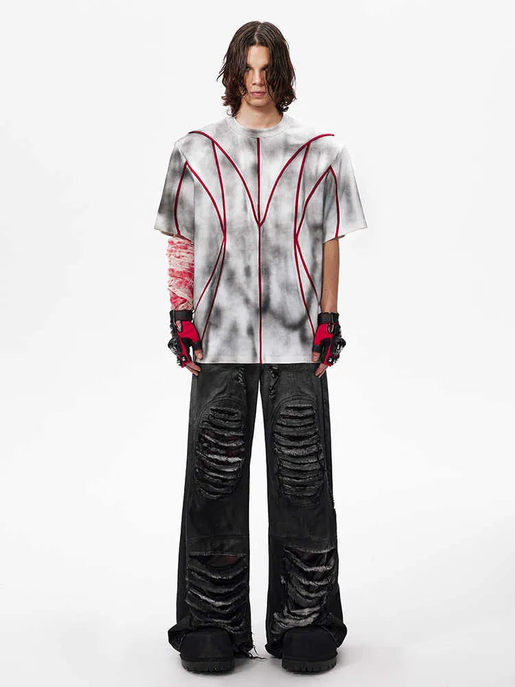 Women's padded shoulder short sleeve T-shirt with textured line patchwork design on front.