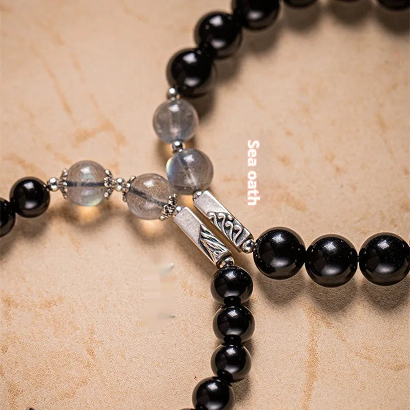 Obsidian Buddha beads couple bracelet DIY kit showing 8mm and 10mm beads for women's and men's spiritual jewellery