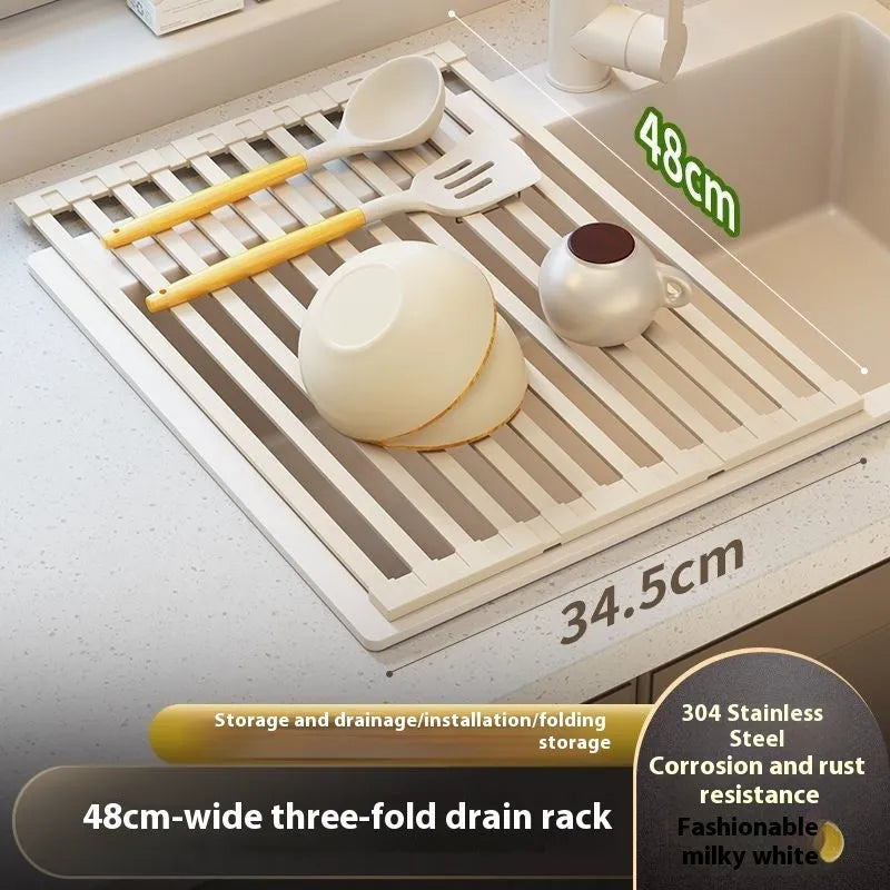 Milky white foldable stainless steel kitchen draining rack for dishes on a countertop