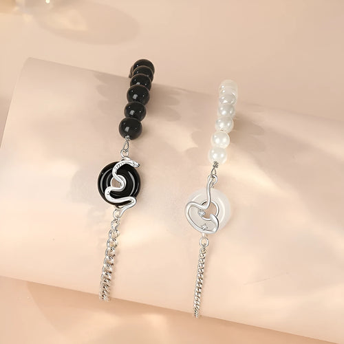 925 sterling silver couple bracelet with snake design and obsidian pearl accents on security buckle