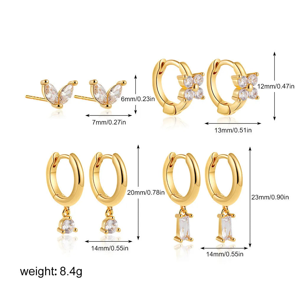 Geometric square zircon copper earrings for women in four-piece set with gold electroplated finish showing star and quadrilateral designs
