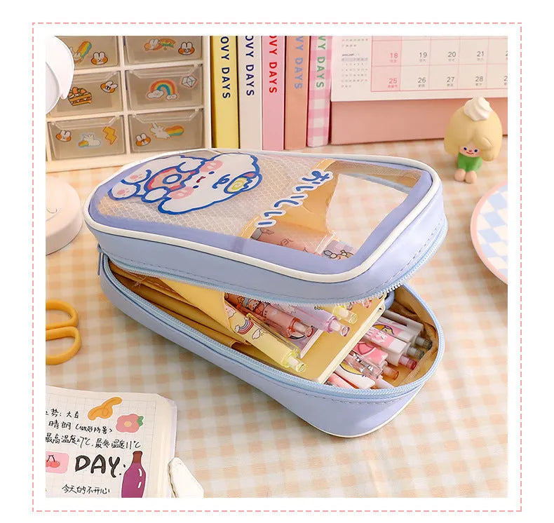 Transparent cartoon pencil case showing interior storage space with zippered closure