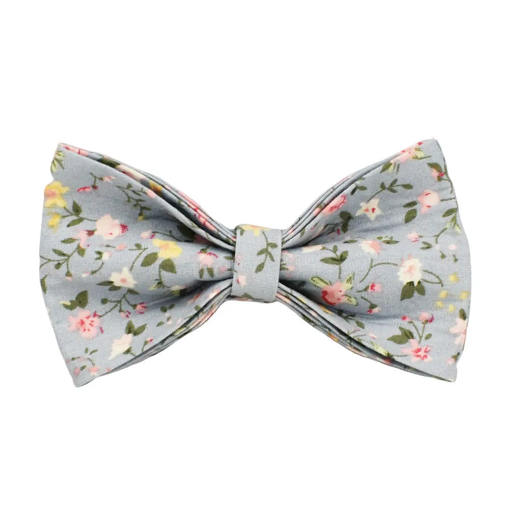 Blue floral pattern dog collar set with matching accessories including bow, leash and vest