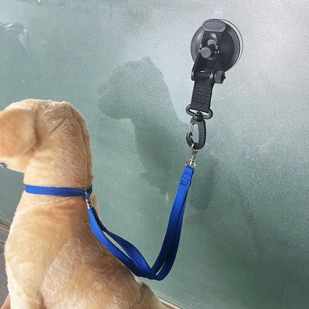 Pet bathing restraint system with suction cups and handcuffs for secure bath time control