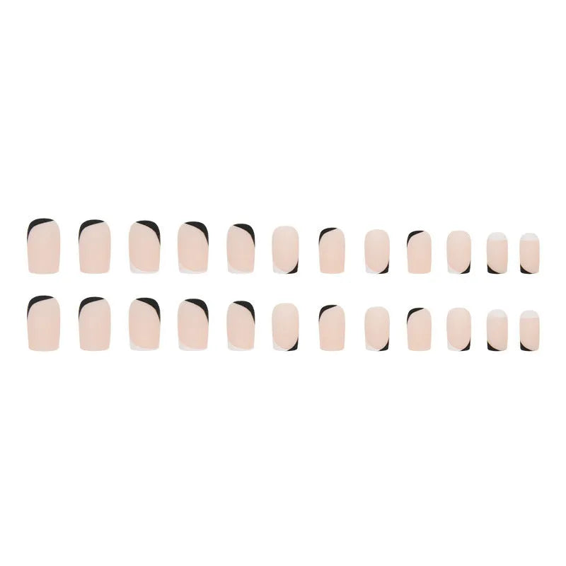Black and white frosted press-on false nails with French manicure style and plastic wearable armour