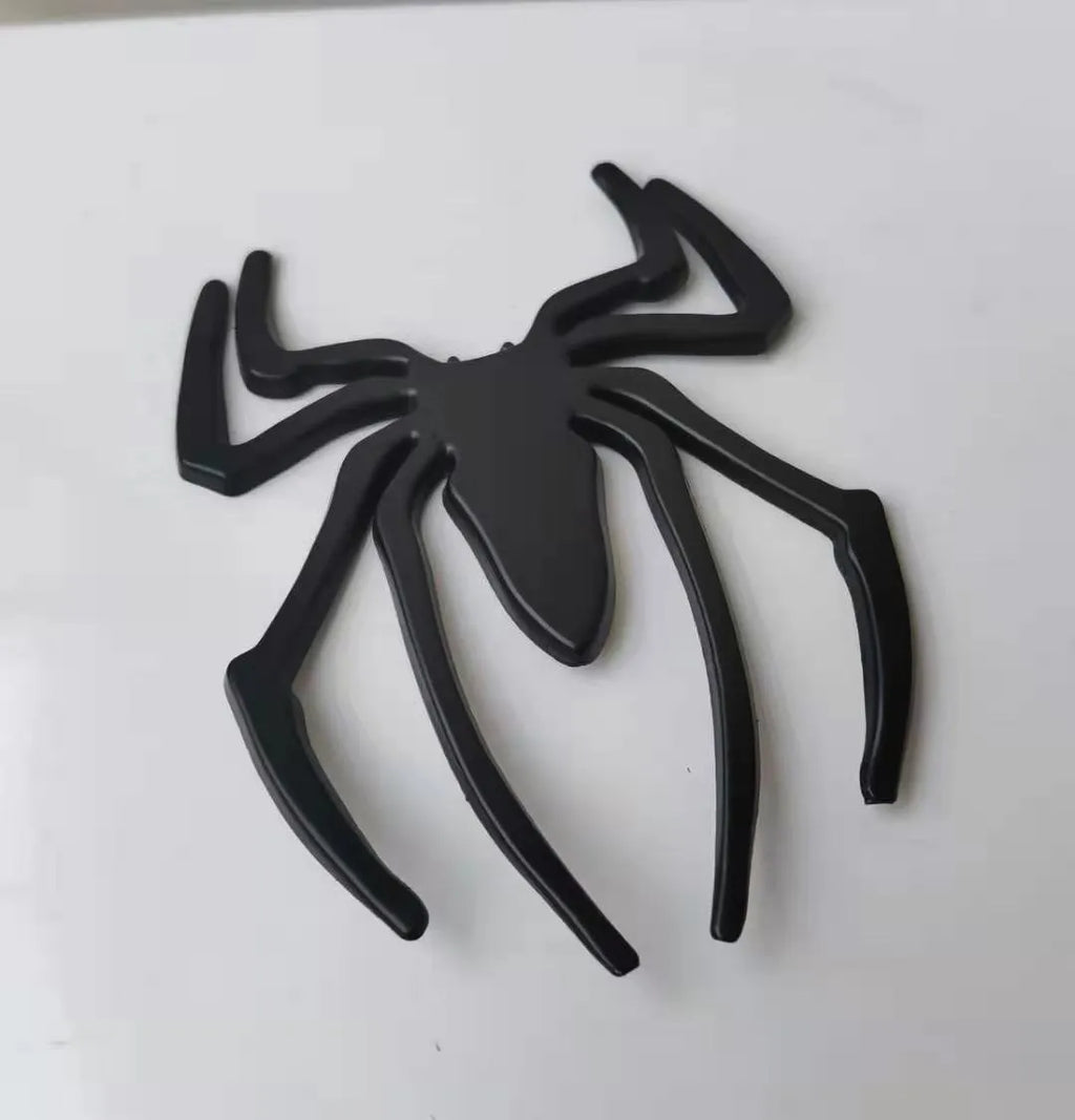 Gold zinc alloy metal spider decorative sticker on a white background