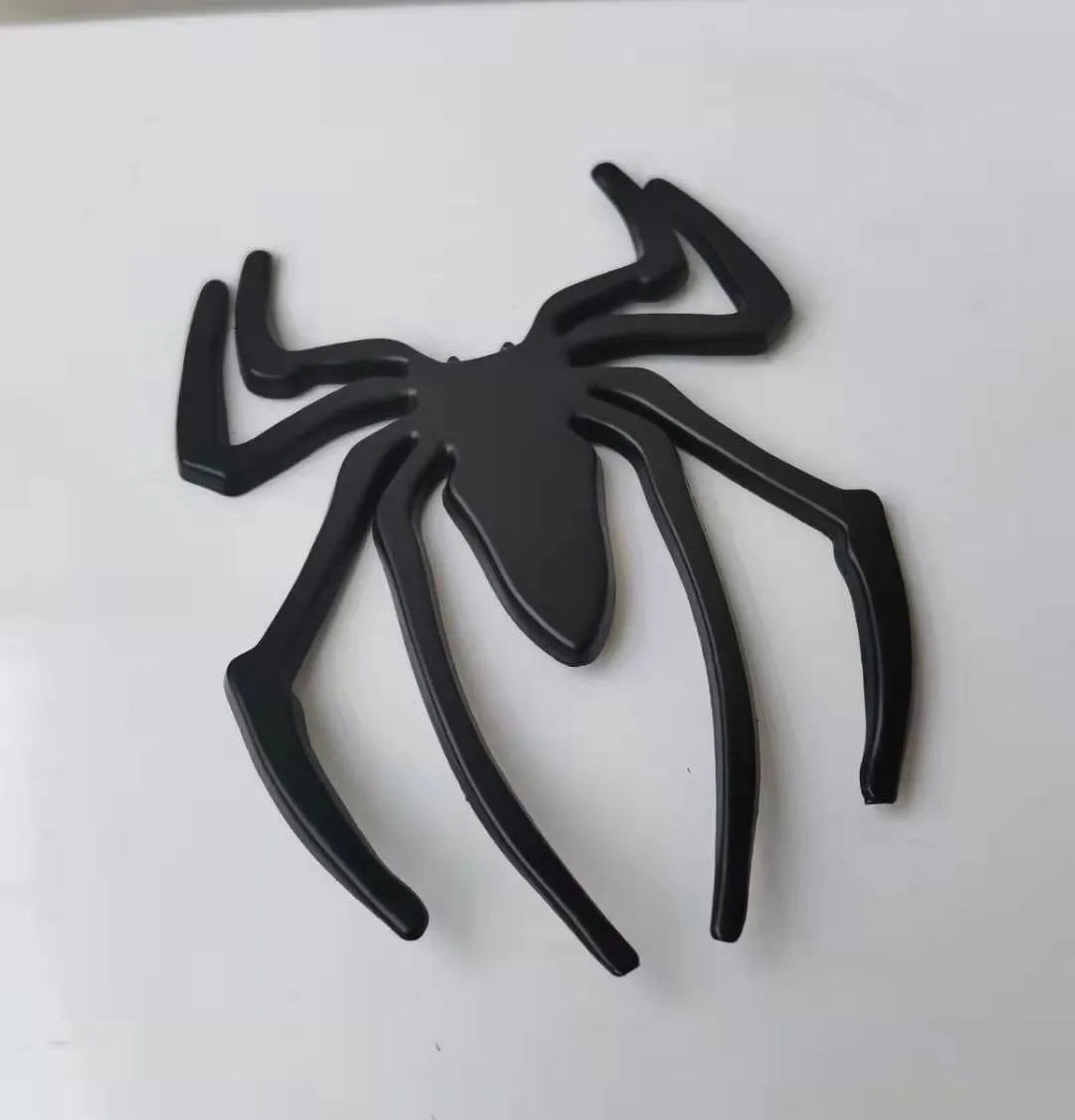 Gold zinc alloy metal spider decorative sticker on a white background