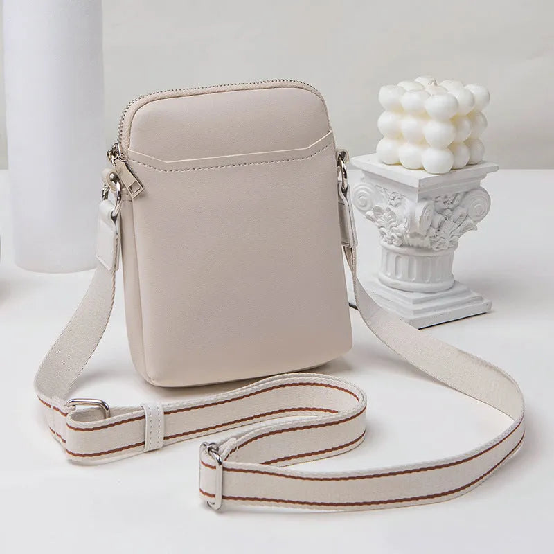 Solid colour women's crossbody phone bag in black, beige, khaki, or green.
