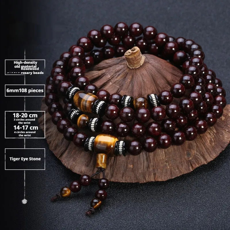 Men's rosewood 108 bead mala bracelet with a turquoise gemstone decorative centrepiece.
