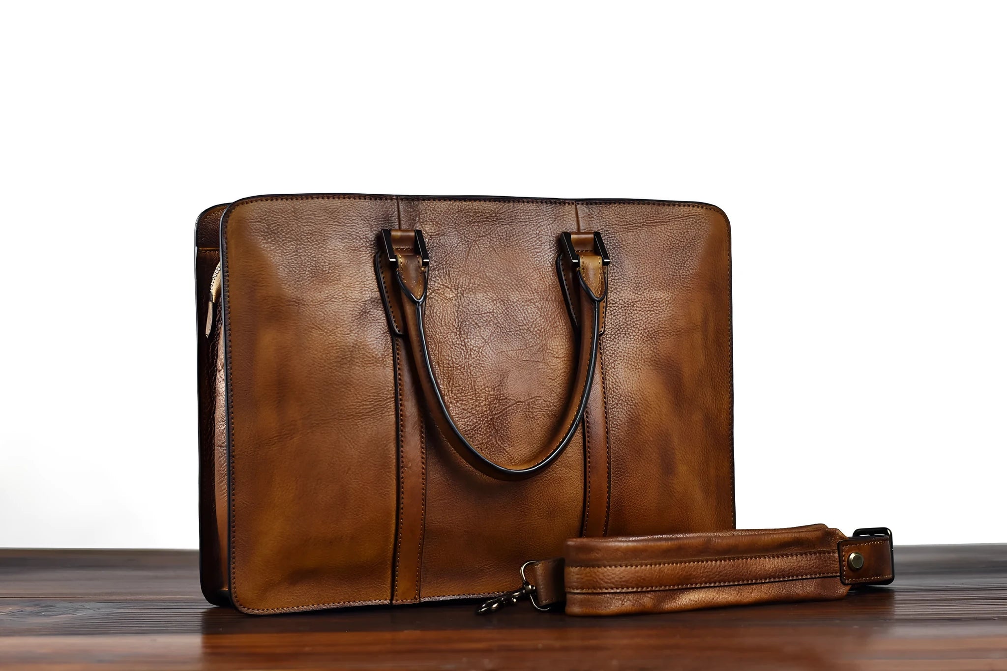 Men's brown leather business handbag with horizontal square shape and zipper opening