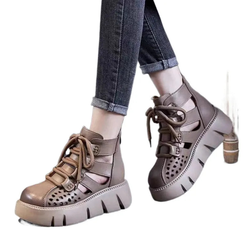 Women's black plush leather platform sandals with fish mouth toe and hollow hole design on a PU sole.