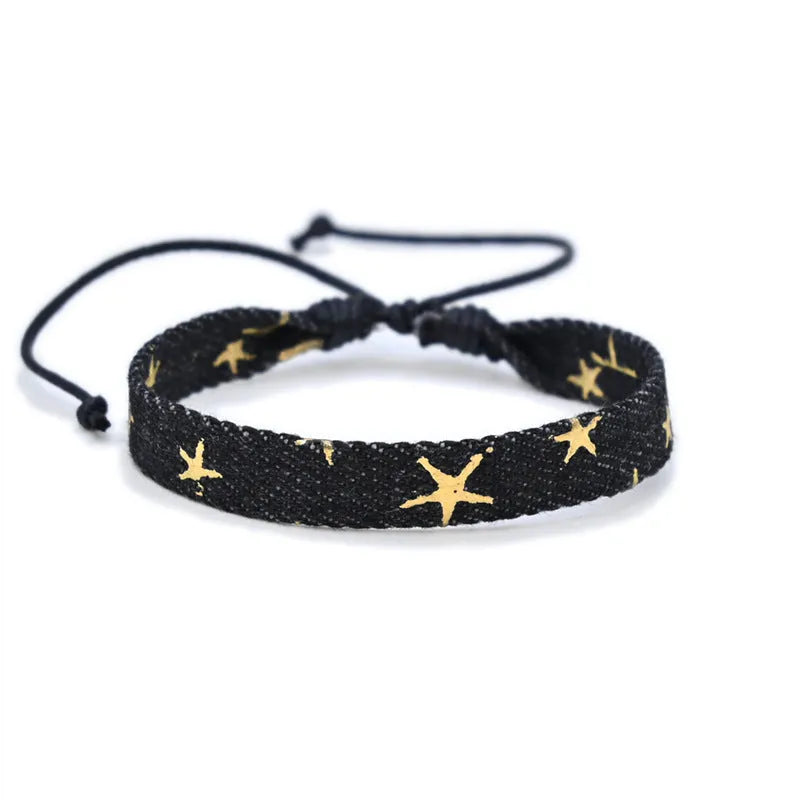 Denim fabric bracelet carrying strap in unisex design with mixed materials and cute styling