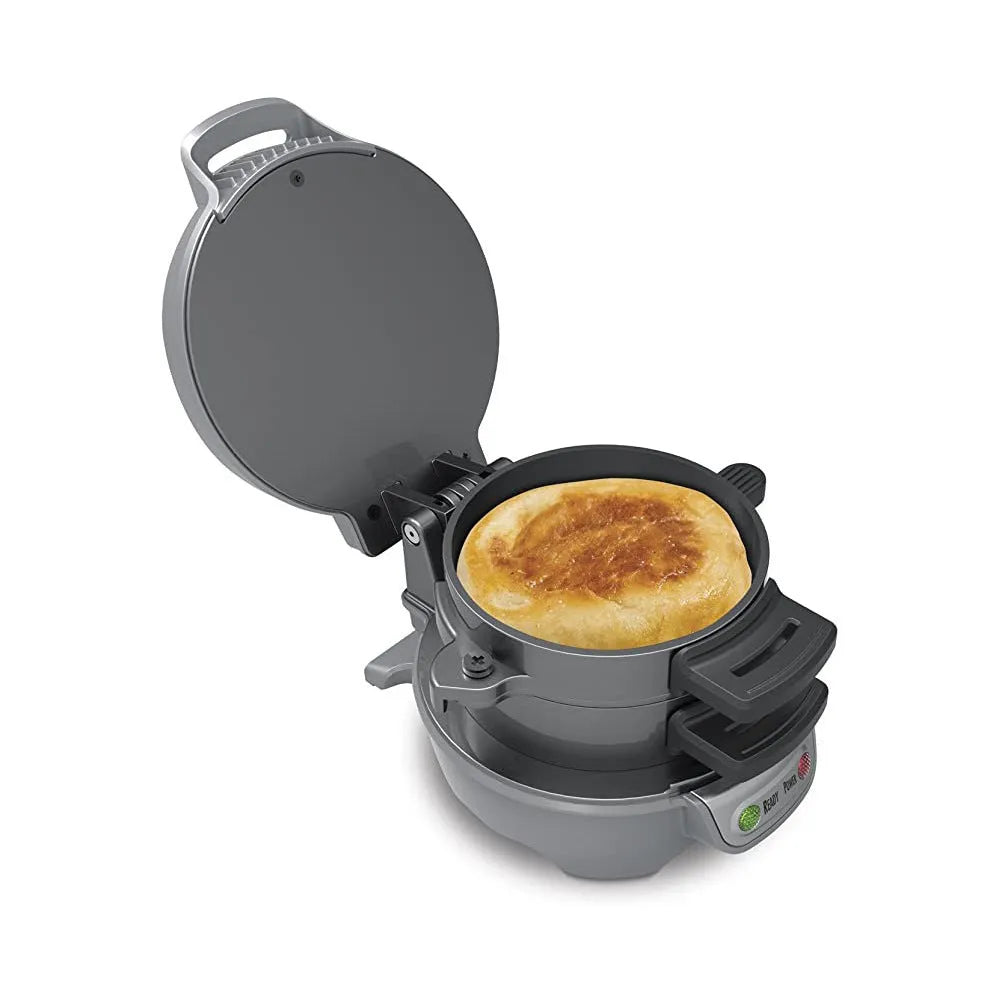 Bright red multifunctional breakfast machine with sandwich plates, waffle grid, and egg cooker ring on a kitchen counter.