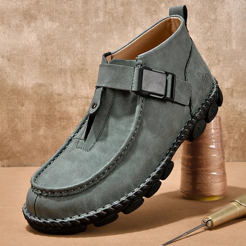 Handmade stitched casual slip-on shoes in black, flat sole with low heel.