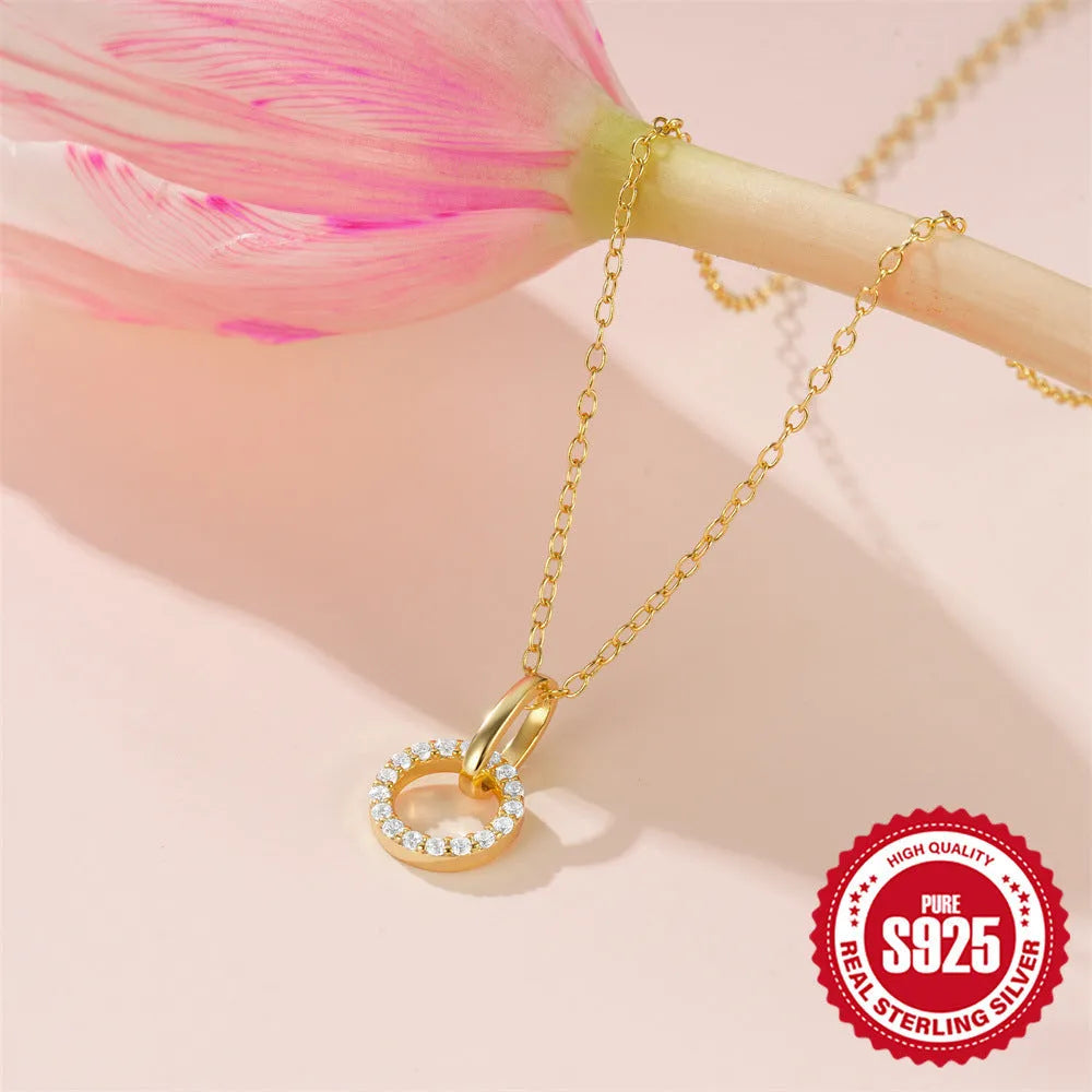 Gold tone adjustable sterling silver clavicle chain with interlocking micro inlaid zircon geometric design