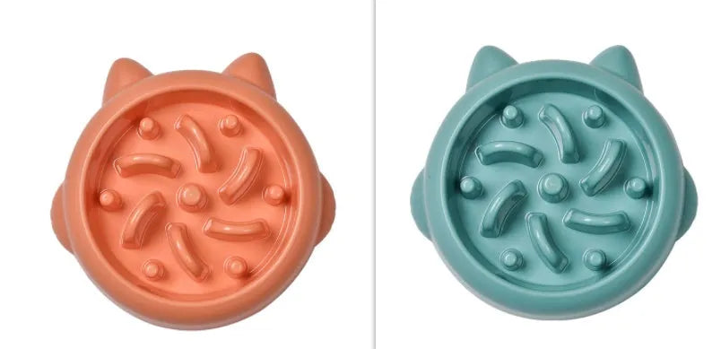Green slow feeder dog bowl with raised bone-shaped ridges inside