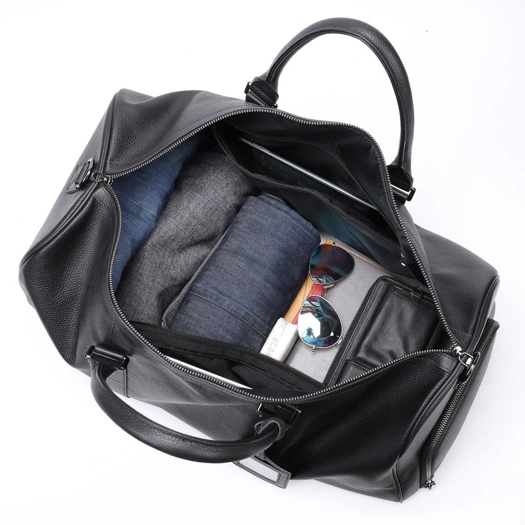 Men's black leather tote bag with single shoulder strap showing 20L capacity