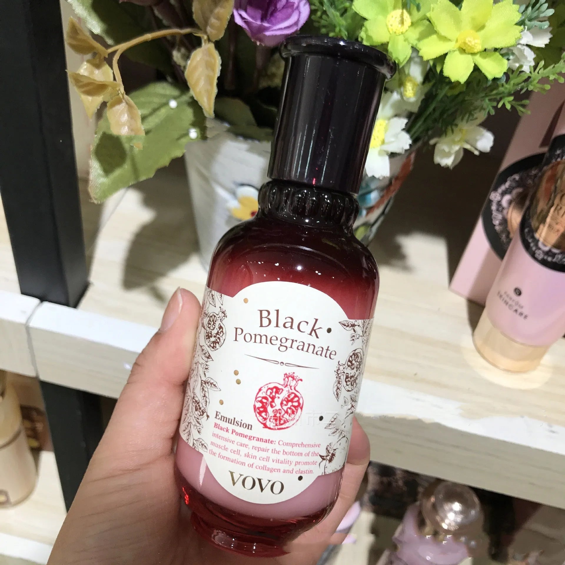Pomegranate skincare set showing six products: water, milk, cream, essence, eye cream and cleanser