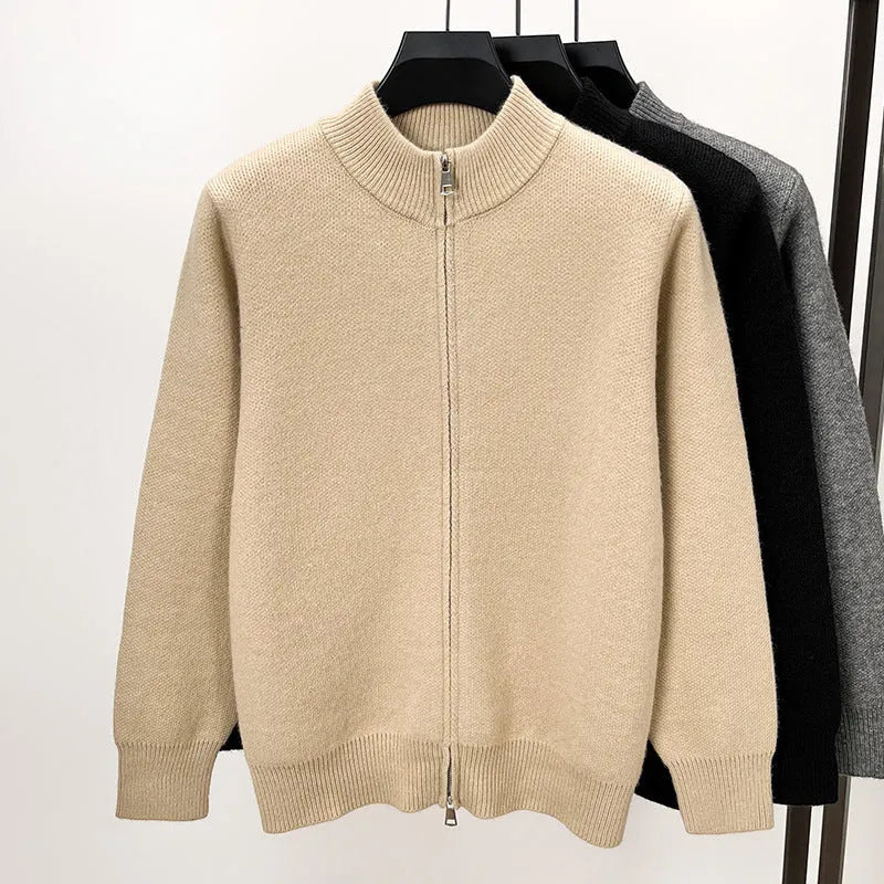 Men's loose grey knitted cardigan with a stand collar and a front zipper.