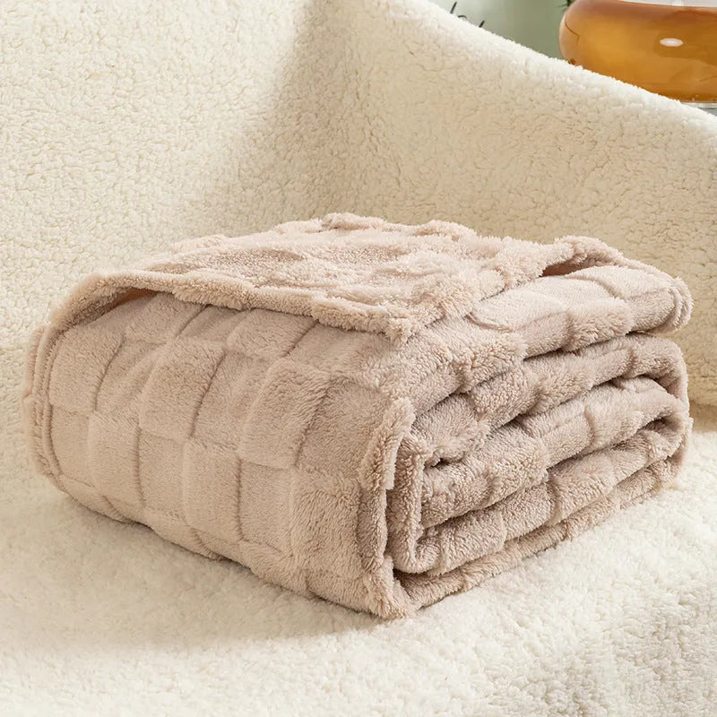 Geometric patterned polyester blanket in milky white showing cotton velvet texture and thickened construction