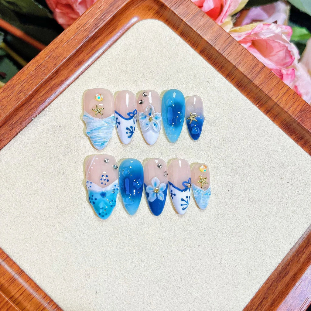 Blue hand-painted carved summer ice transparent plastic fake nails with floral design