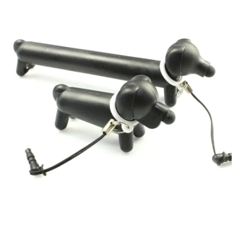 Black dog-shaped touch screen stylus with 12cm length shown on desk