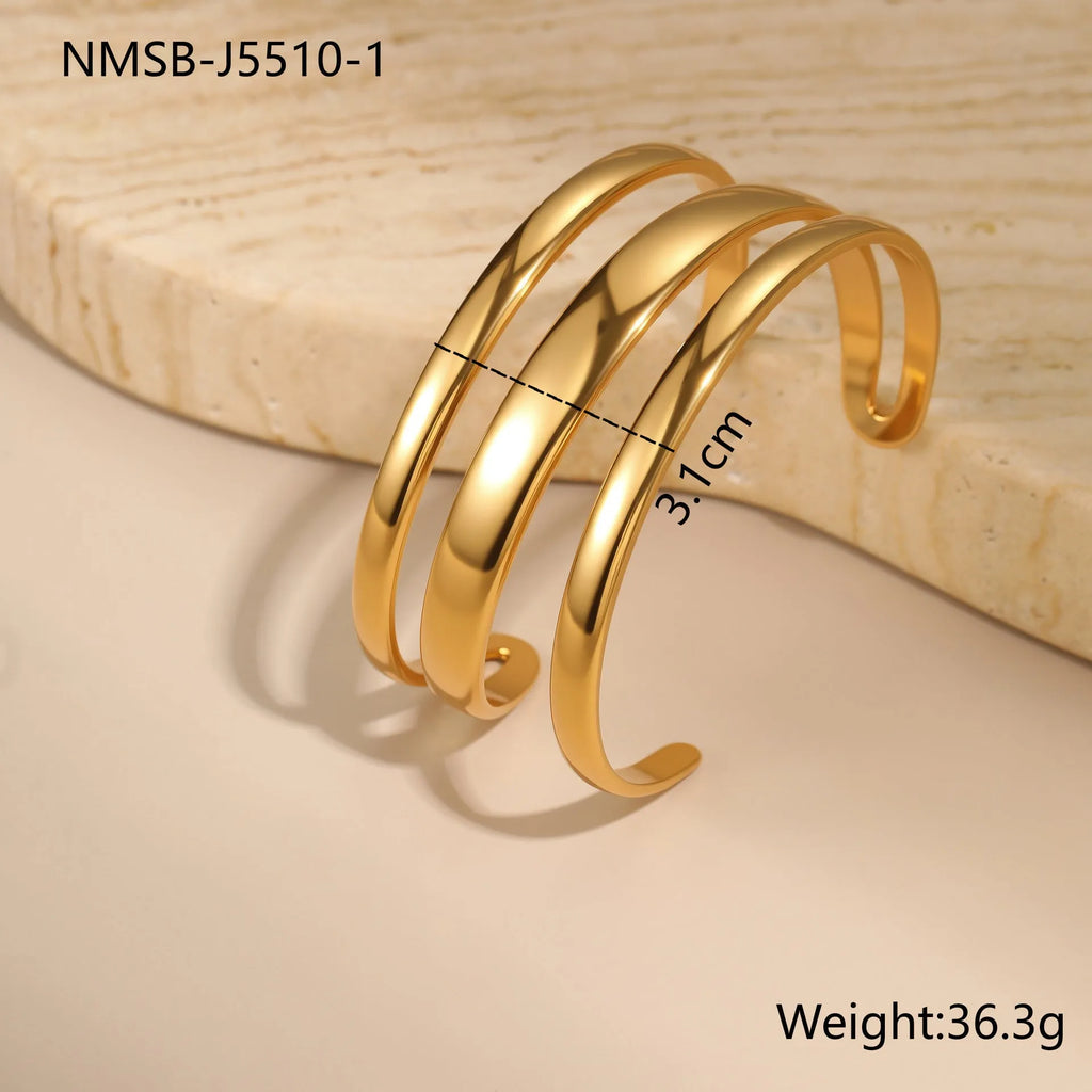 Geometric stainless steel women's bracelet with a simple opening mechanism, shown in gold and steel finish options.