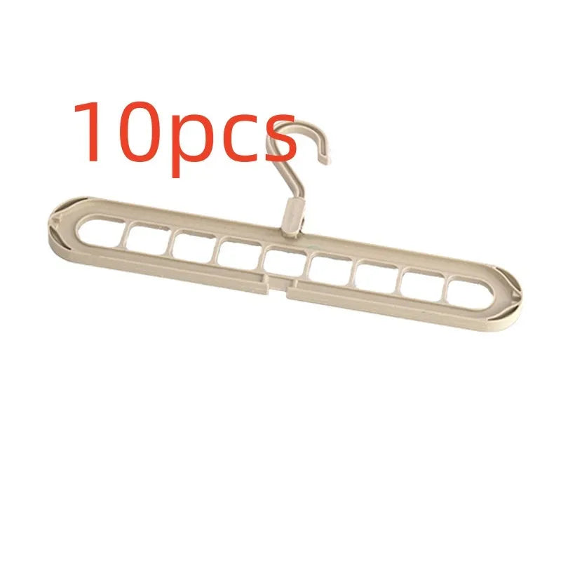 Multifunctional plastic nine-hole folding hanger for trousers, shown in beige, blue, green, pink, and grey colour options.