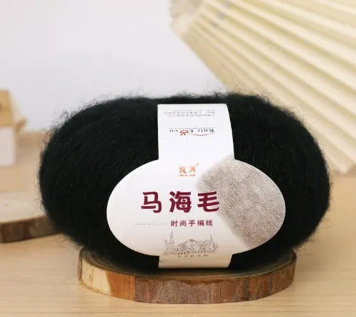 DIY mohair scarf weaving kit showing one wool ball and a selection of 34 colour options including white, pink, blue and green.