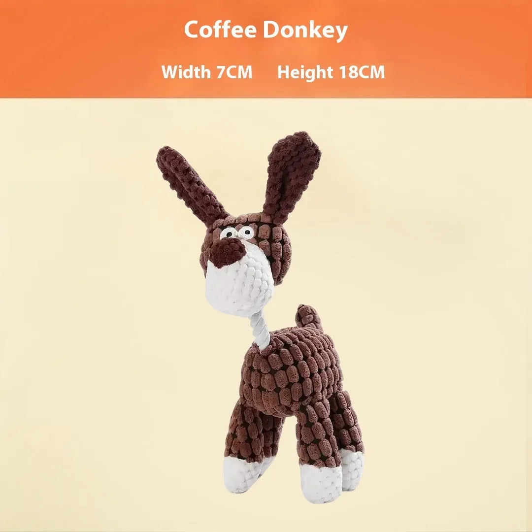 Assorted plush pet chew toys including a blue elephant, a duck, and a donkey in different colours