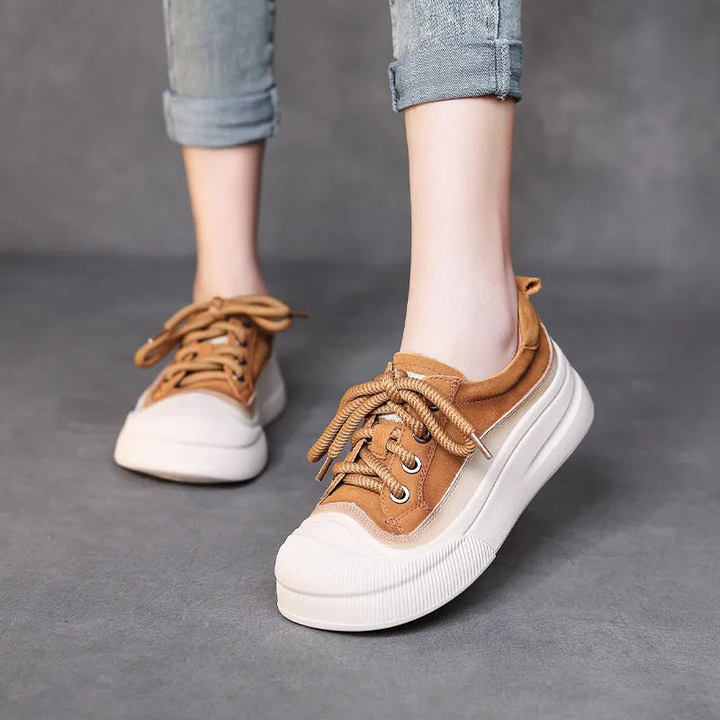 Women's yellow leather lace-up casual shoes with round toe and rubber sole.