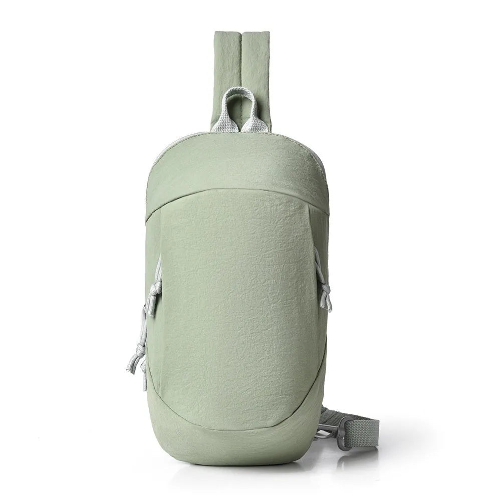 Outdoor crossbody bag in nylon fabric with mobile phone compartment, shown in army green colour