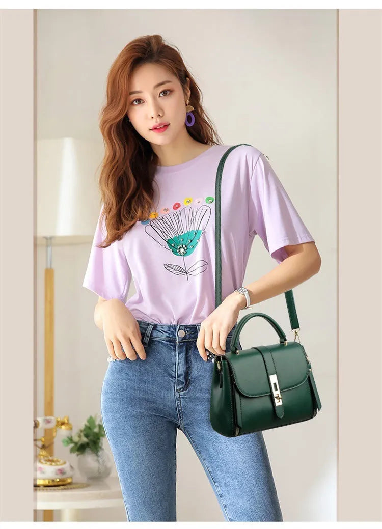 Women's soft leather shoulder bag in messenger style with adjustable strap