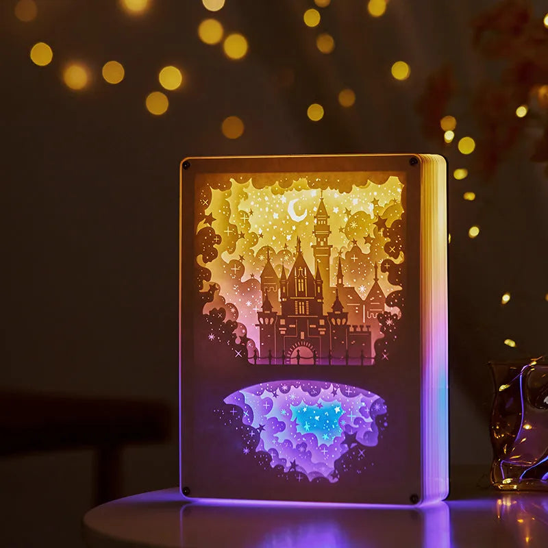 USB bedside night light with carved plastic shade and remote control on a table