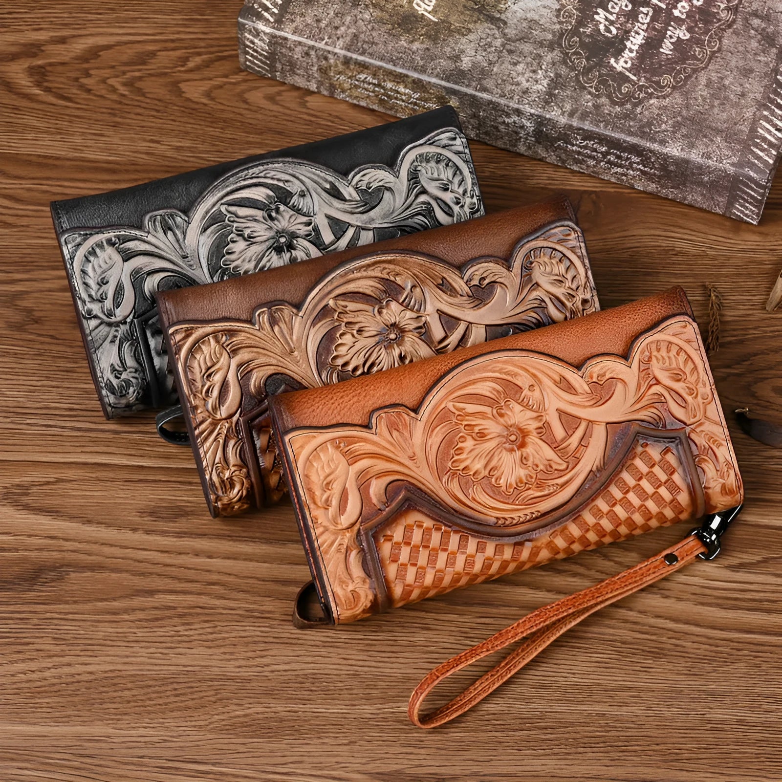 Women's brown tri-fold leather wallet with embossed Chinese floral pattern showing multiple compartments