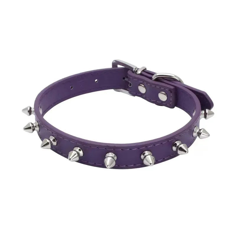 A studded dog collar made of black PU leather with metal studs and an alloy buckle