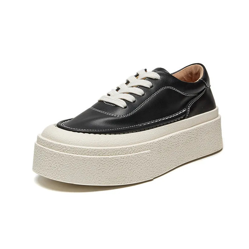 Women's black and white platform casual sports shoes with cowhide leather upper and round toe.