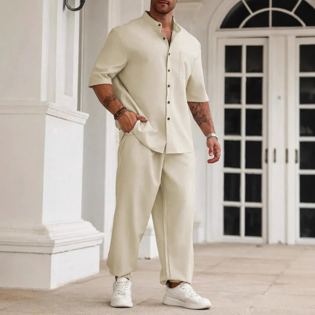 Men's apricot coloured cotton linen casual short-sleeved shirt and trouser set laid flat.