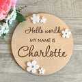 Square wooden baby birth announcement plaque showing newborn name and details